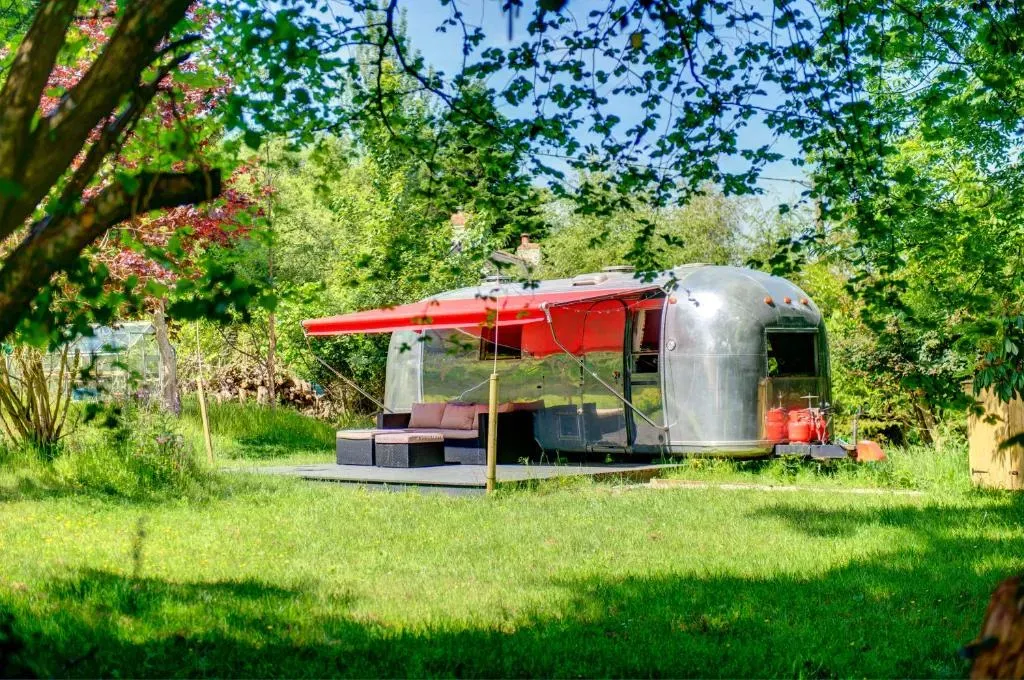 Vintage glamping Airstream with Farm Animals